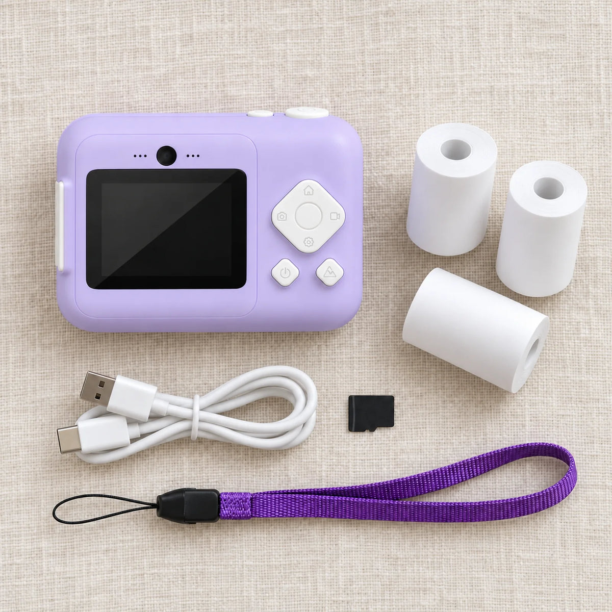 What's in the box: camera, 3 paper rolls, memory card, cable, lanyard