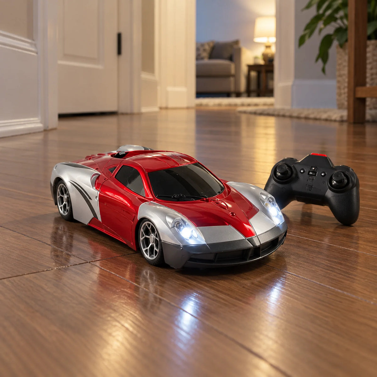 Red wall-climbing car with its remote